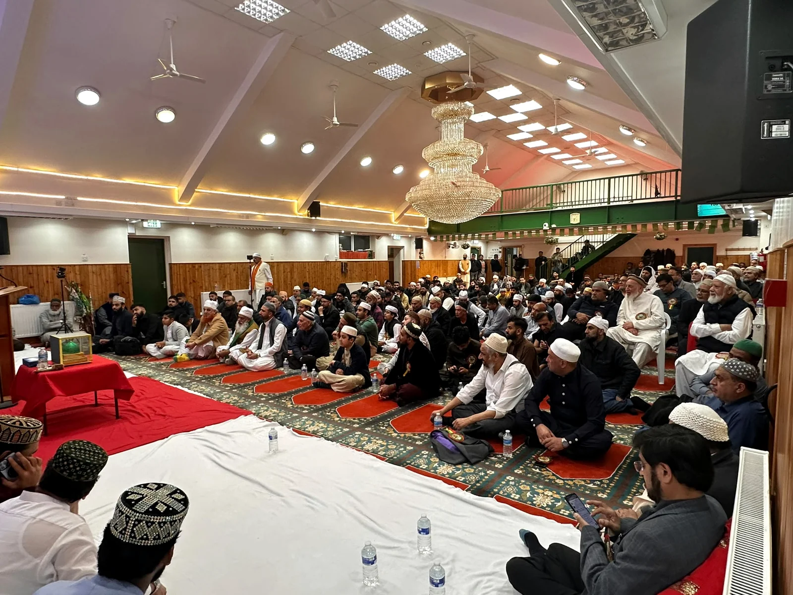 Worshippers and community members gathered in the mosque hall