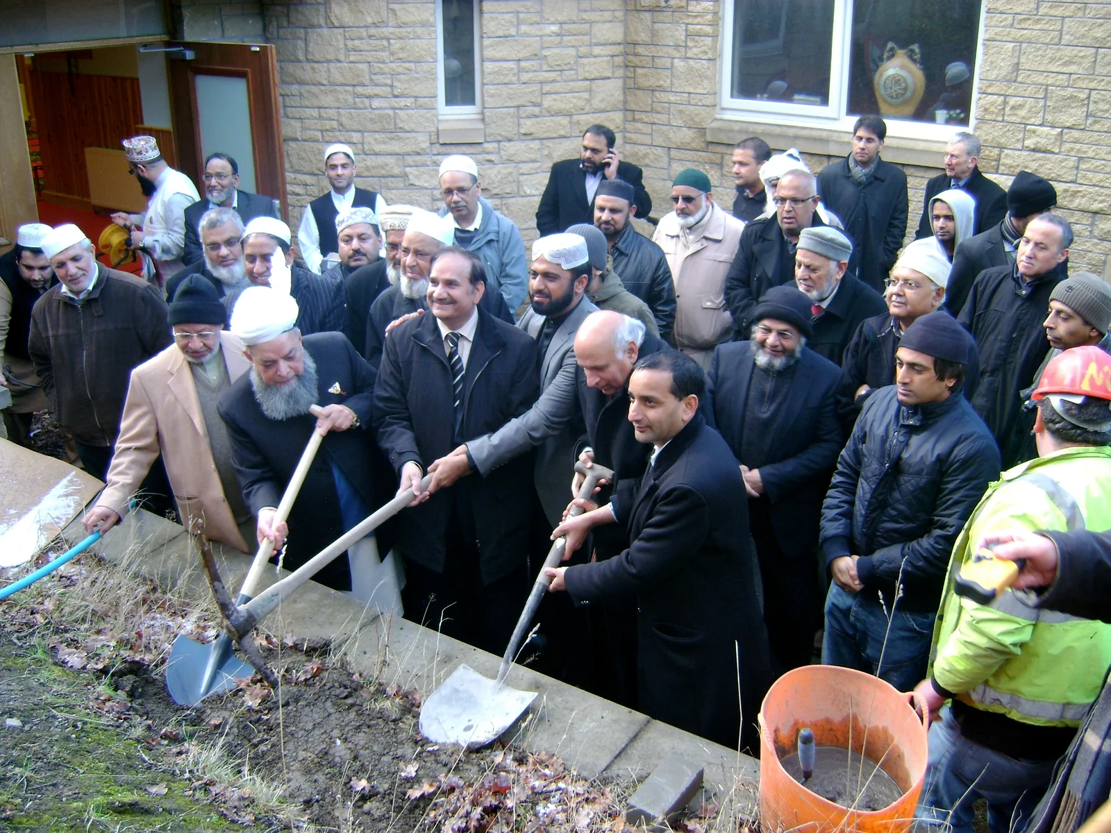 Community members attending an event associated with the mosque expansion